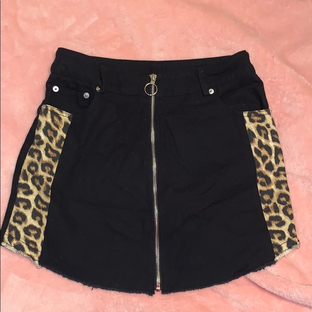 zip front black mini skirt with cheetah print